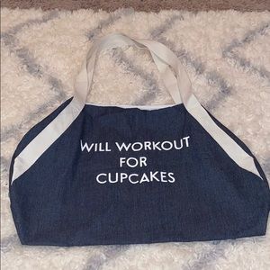 Duffle Bag thats says “Will Workout For Cupcakes”